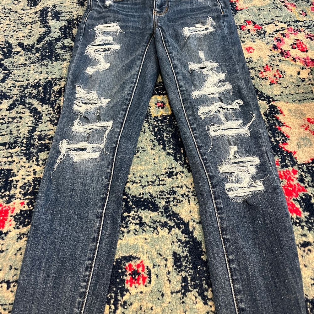 Distressed Blue Jeans